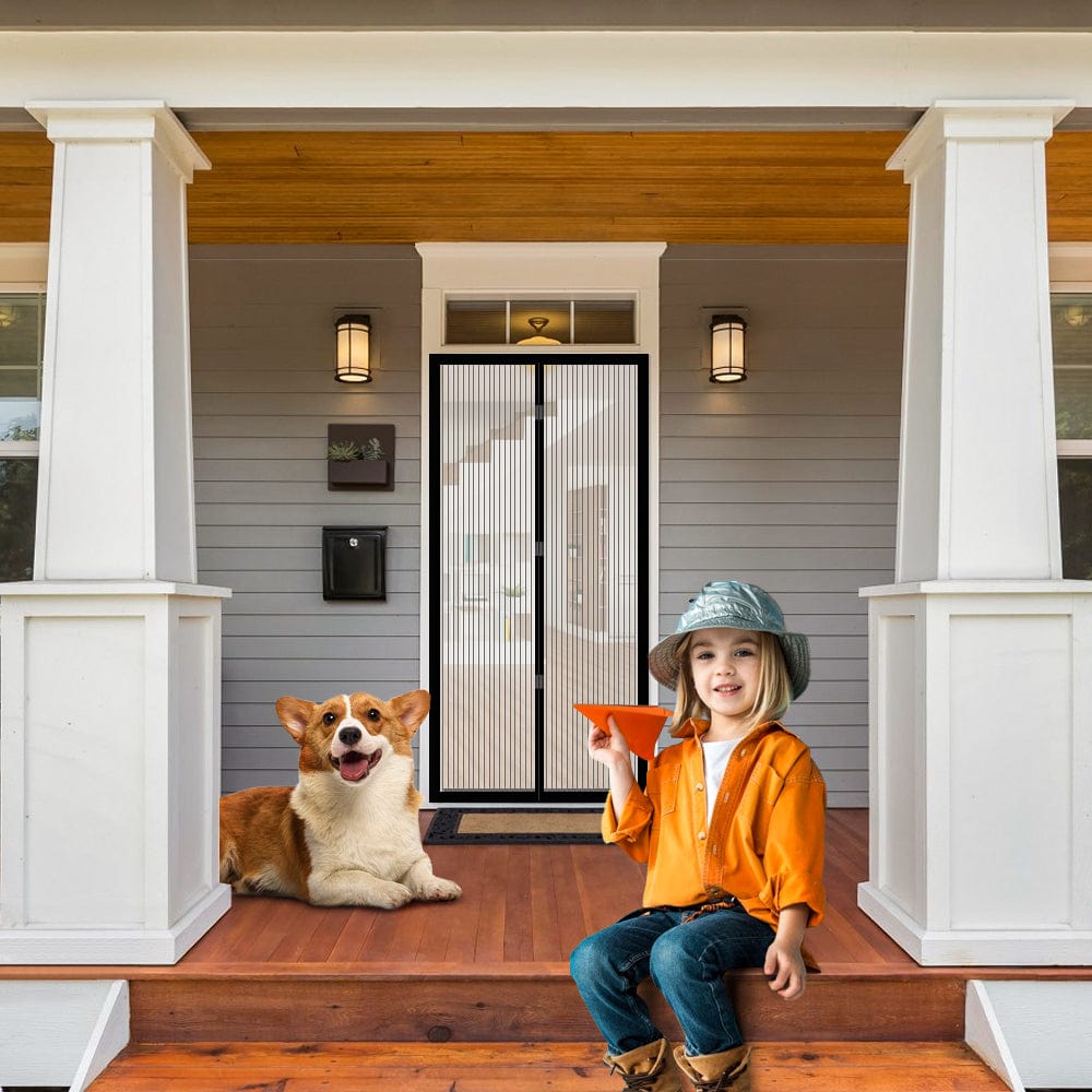 Fly screen door curtain with black-framed vertical mesh at the entry