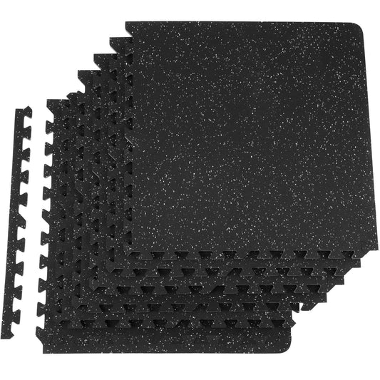 Stacked interlocking floor mat tiles with speckled dark top and studs