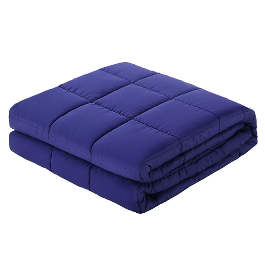 Blue weighted blanket folded, showing thick padded quilted panels.