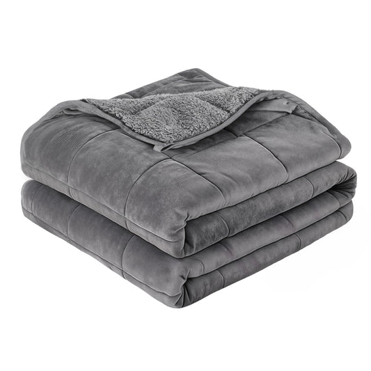 Gray weighted blanket with plush sherpa panel, folded with quilted sections