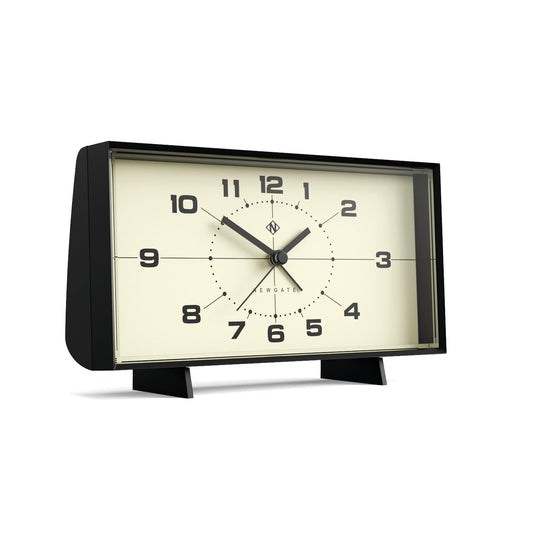 Black rectangular alarm clock with cream dial and analog hands, back stand