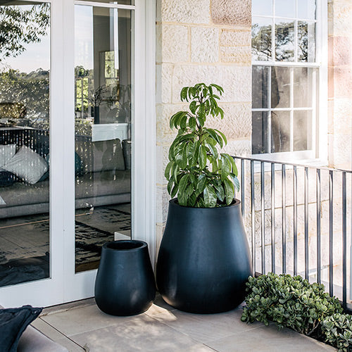 Two dark matte planter pots, wide rim and rounded shape, set of 2.