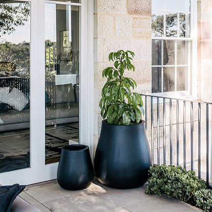 Two dark matte planter pots, wide rim and rounded shape, set of 2.