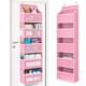 Pink wall-mounted doll storage rack with hooks and multi-compartment shelves