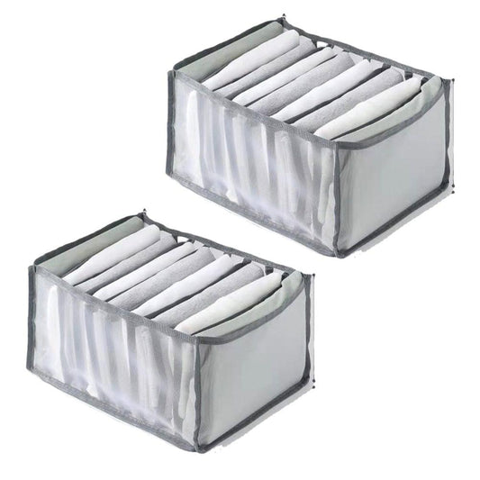 Two fabric storage bins with dividers for neatly folded clothing, white exterior