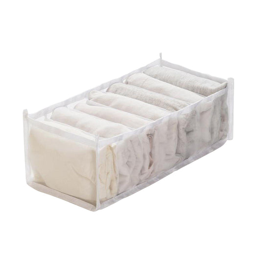 Foldable clothes organizer drawer with clear mesh compartments, light beige fabric.