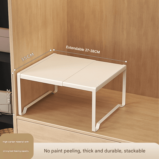 Expandable white closet shelf organizer with telescopic frame and raised edges