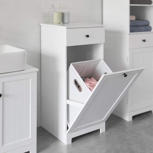 White bathroom cabinet with open laundry hamper door and front drawer, metal handle