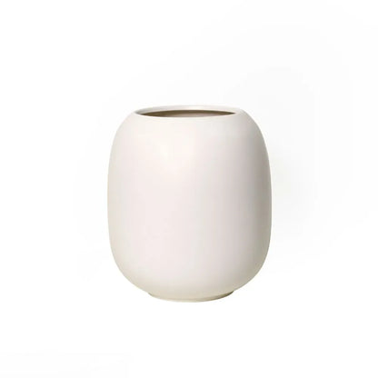 Matte white ceramic vase with open top and rounded, tapered body