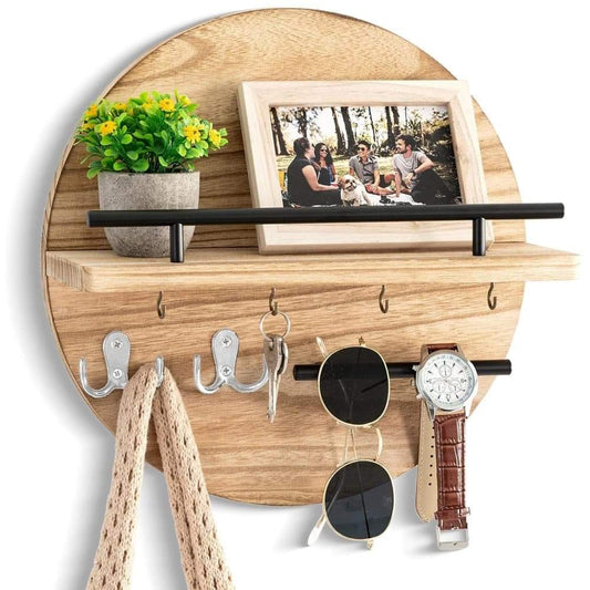 Light brown wooden key holder with shelf and metal hooks for keys and small items