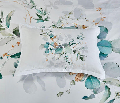 Pillowcase and duvet cover with white botanical print and teal eucalyptus leaves