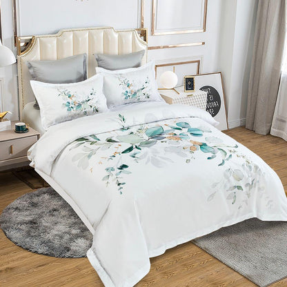 Queen quilt cover set on bed: white cover with teal and green leaf and flower print