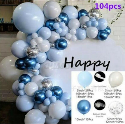 Blue balloon garland arch with metallic silver accents and large round filler balloons