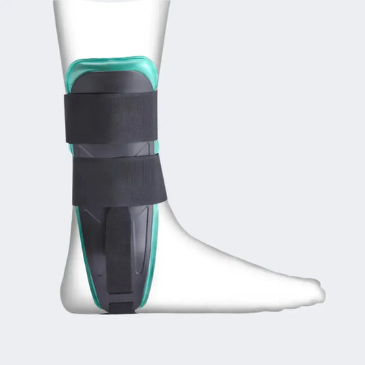 Joynz ankle stirrup supports, black with teal trim, worn over ankle