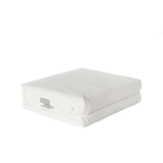 Folded white quilt cover with light grey trim