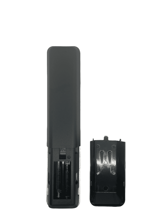 Kogan TV remote control with battery compartment door open, showing contacts