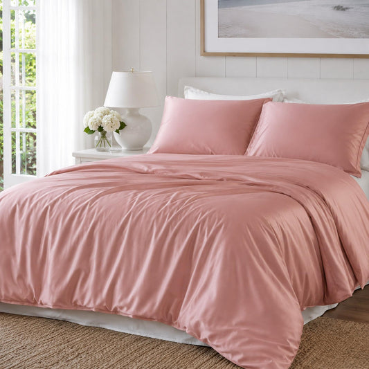 Coral pink bamboo quilt cover with pillow shams, smooth satin-like finish