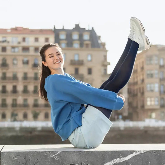 Black thigh-high compression stockings with closed toe, shown on legs