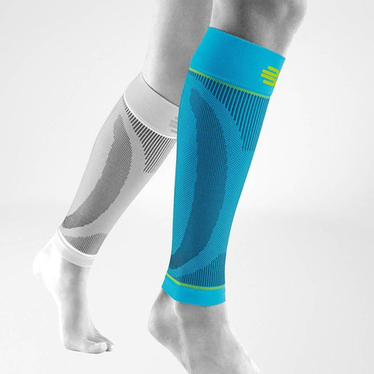 Teal sports compression calf sleeves with neon green trim, knit support panels