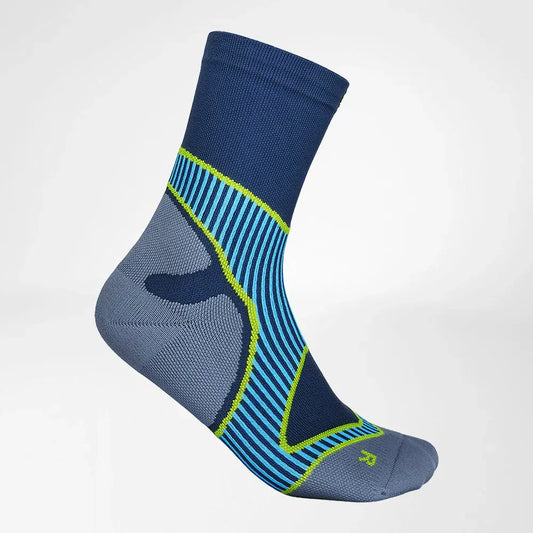 Mid-cut performance socks in dark blue with neon green stripes and heel patch