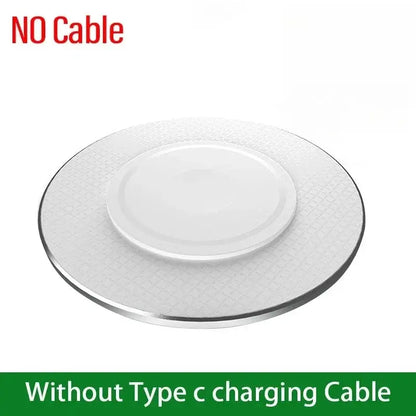 White wireless charging pad without cable, smooth center charging surface, top view.