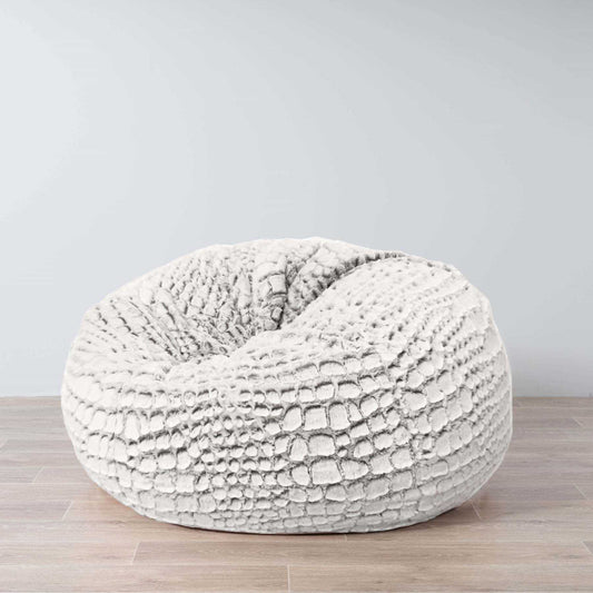 White textured faux-fur bean bag with rounded oval shape and stitched panel pattern