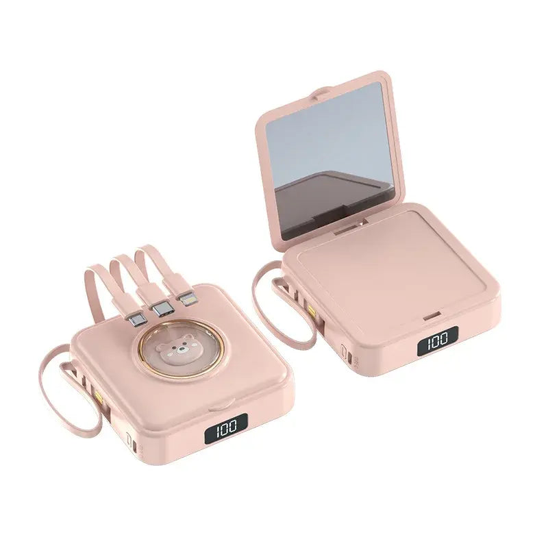 Light pink makeup mirror power bank with pet cartoon face, mirror open, attached cables