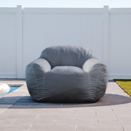 Charcoal grey outdoor bean bag chair with rounded seat and armrests