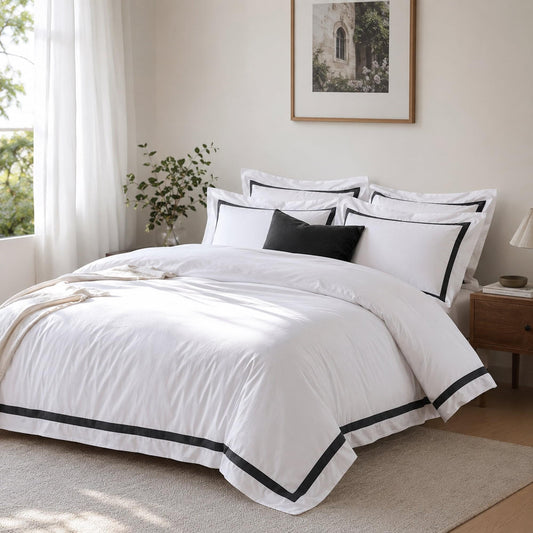 White quilt cover set with dark charcoal trim and matching pillowcases