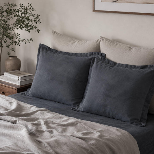 Charcoal fur velvet European pillowcases on bed, two rectangular pillow covers