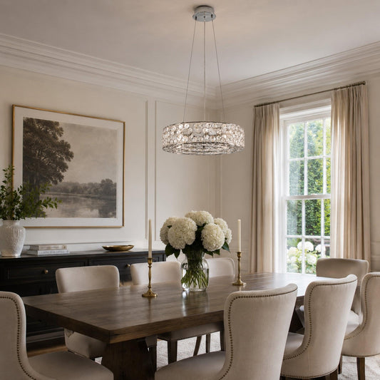 Chrome crystal pendant light with round drum shade made of clear glass crystals