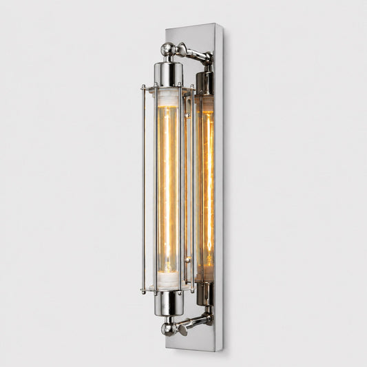 Chrome wall sconce lamp with clear glass cylinder cage and glowing filament bulbs