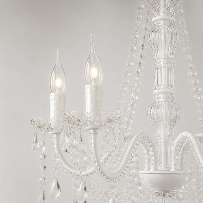 Clear flame-tip candle bulbs in a chandelier, E14 screw bases visible