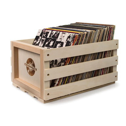 Crosley Voyager record storage crate with stacked vinyl records and front logo