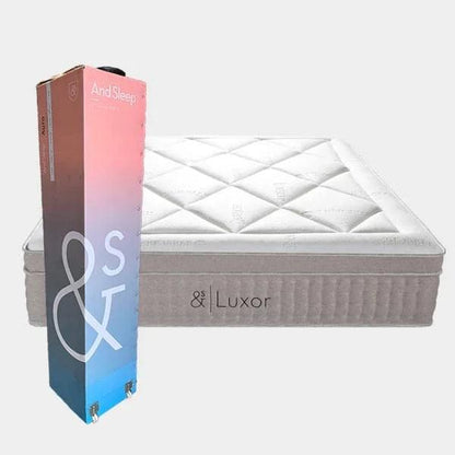 Grey and white Luxor mattress with quilted top, side label visible