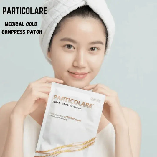 Medical cold compress dressing patch pack held in hands, PARTICOLARE platinum salmon