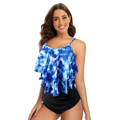 Women’s blue tie-dye ruffle swim tank with black high-waist bikini bottoms