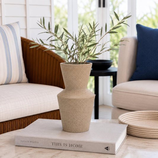 Speckled clay ceramic vase with two stacked hourglass shapes and tapered neck.