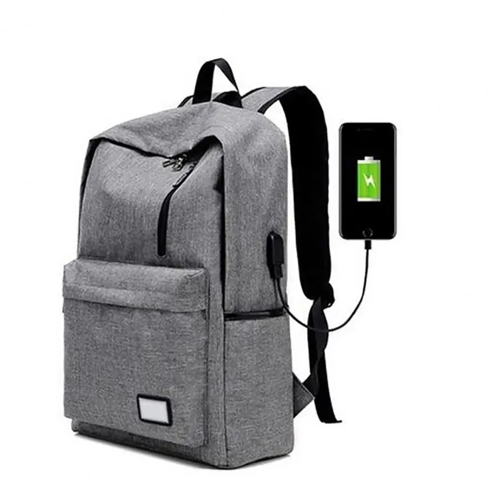 Outdoor backpack with black external charging cable connected to a phone