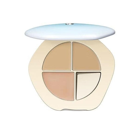 Cream concealer palette compact with four beige and tan shade pans