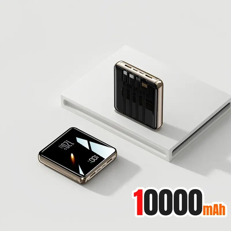 Mini power bank with side charging port panel and front LED display, black with silver trim