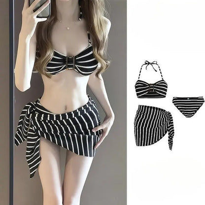 Women's black-and-white striped halter bikini set with matching bottom and side drape