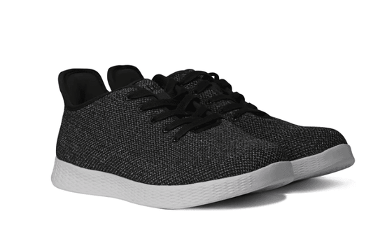 Women’s charcoal lightweight orthotic walking shoe with black laces and white cushioned sole