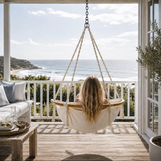 Montego padded hanging hammock chair with cream cushion and wooden spreader bars