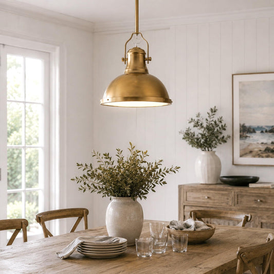 Gold metal pendant light with dome shade and hanging stem