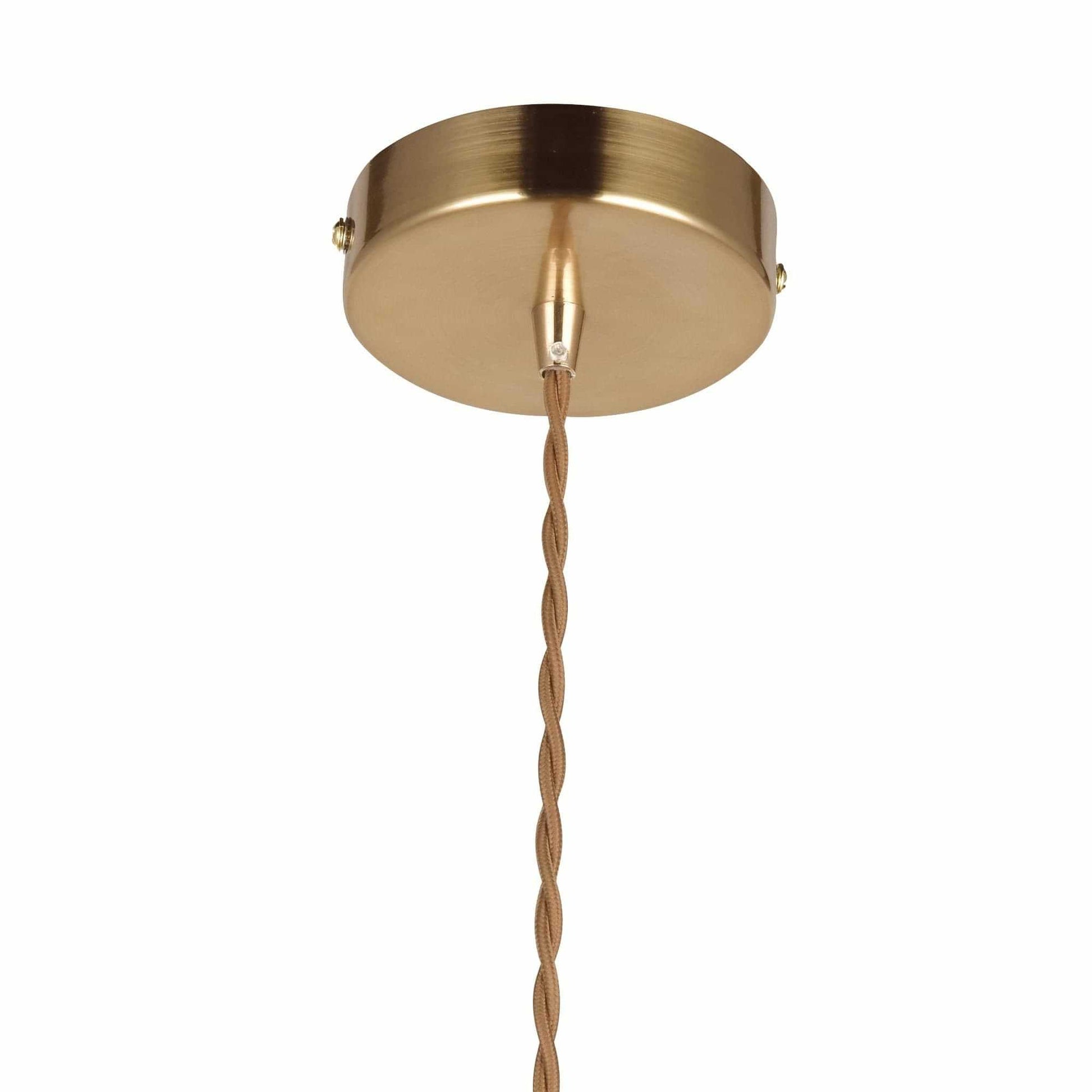 Brass-toned ceiling canopy with twisted cord for pendant light