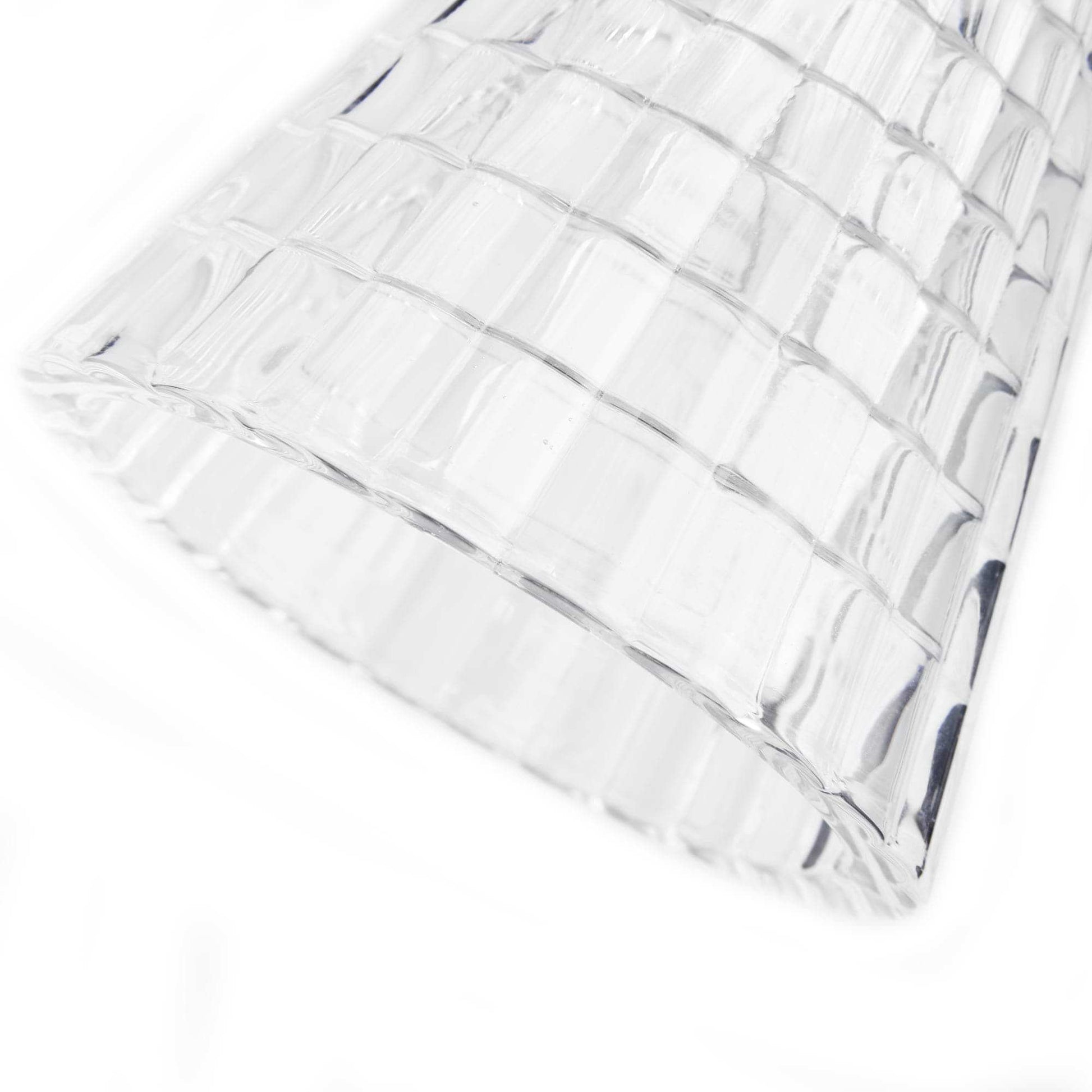 Close-up of clear ribbed glass pendant shade with horizontal tiered panels.