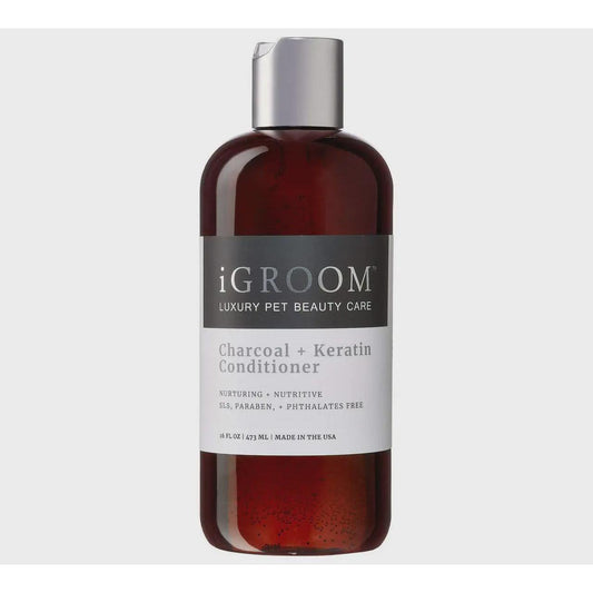 iGroom charcoal plus keratin conditioner in amber bottle with silver cap