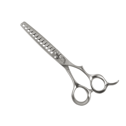 Silver hair cutting scissors with large finger holes and toothed cutting comb on blade