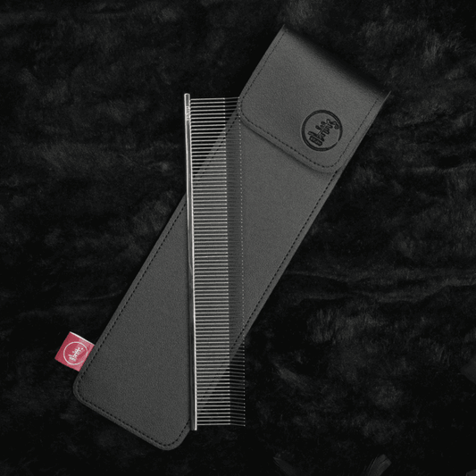 Hair lift comb in black open case with metal teeth and precision rows